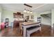Elegant dining area with custom cabinets, modern lighting, and seating for Gathering and guests at 2002 Wingate Rd, Atlanta, GA 30341