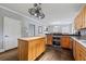 Spacious kitchen featuring wood cabinets, stainless appliances and center island at 2002 Wingate Rd, Atlanta, GA 30341
