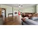 Inviting living room featuring a fireplace, hardwood floors, and comfortable seating at 2002 Wingate Rd, Atlanta, GA 30341