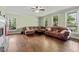 Spacious living room with hardwood floors, fireplace, and plenty of natural light at 2002 Wingate Rd, Atlanta, GA 30341