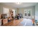 Home office featuring hardwood floors, natural light, and convenient access to the outdoor deck at 2002 Wingate Rd, Atlanta, GA 30341