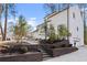 A modern home with a white exterior, black trim, and landscaped front yard at 2626 Shadow Woods Ne Cir, Marietta, GA 30062