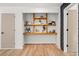 Hallway with decorative shelves and modern design at 2626 Shadow Woods Ne Cir, Marietta, GA 30062