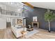 Open-concept living room with fireplace, balcony, and modern decor at 2626 Shadow Woods Ne Cir, Marietta, GA 30062