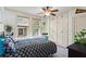 Stylish bedroom offers ample storage with custom built-ins and a unique ceiling fan for comfort at 2653 Brookwood Ne Dr, Atlanta, GA 30305