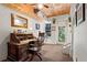 Home office featuring an antique wooden desk, ceiling fan, and a door to the backyard at 2653 Brookwood Ne Dr, Atlanta, GA 30305