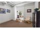 Bright sitting room features classic furnishings, neutral color palette, and cozy atmosphere for relaxation at 2653 Brookwood Ne Dr, Atlanta, GA 30305