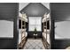 Bedroom with four custom bunkbeds and a center table and light, perfect for shared living space at 3882 The Ascent Ne, Brookhaven, GA 30319