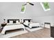Bright bedroom with vaulted ceilings, skylights, ceiling fan, and comfortable queen size beds at 3882 The Ascent Ne, Brookhaven, GA 30319
