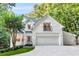 Stunning two-story white brick home with well-manicured landscaping and a private balcony at 3882 The Ascent Ne, Brookhaven, GA 30319