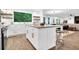 Spacious kitchen with large island and seating area, lots of natural light and modern appliances at 3882 The Ascent Ne, Brookhaven, GA 30319