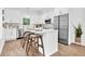 Stylish kitchen with a center island, modern appliances, and ample counter space at 3882 The Ascent Ne, Brookhaven, GA 30319