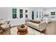 Open-concept living area with modern decor and seamless flow to the kitchen at 3882 The Ascent Ne, Brookhaven, GA 30319