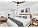 Spacious primary bedroom boasting a ceiling fan, ample space, and natural light at 3882 The Ascent Ne, Brookhaven, GA 30319