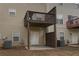 The backyard features a small patio, convenient access to the property, and two air conditioning units at 5381 Briar Creek Ln, Norcross, GA 30071