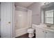 Clean bathroom featuring a shower-tub combo, modern vanity, and wood-look flooring at 5381 Briar Creek Ln, Norcross, GA 30071