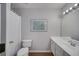 Well-lit bathroom with white vanity and modern fixtures at 5381 Briar Creek Ln, Norcross, GA 30071