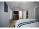 Serene bedroom featuring a spacious closet and neutral decor at 5381 Briar Creek Ln, Norcross, GA 30071