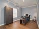 Versatile bedroom with wood floors, modern lighting and closet at 5381 Briar Creek Ln, Norcross, GA 30071