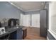 Large bedroom with wood floors, recessed lighting, and a closet at 5381 Briar Creek Ln, Norcross, GA 30071