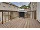 Exterior view of the wooden deck with a barbecue grill, perfect for outdoor cooking and relaxation at 5381 Briar Creek Ln, Norcross, GA 30071