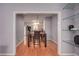 Open dining room with hardwood floors and direct access to the modern kitchen at 5381 Briar Creek Ln, Norcross, GA 30071