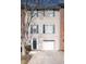 Charming townhouse with an attached garage and a well-manicured front yard at 5381 Briar Creek Ln, Norcross, GA 30071