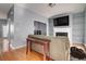 Inviting living room with hardwood floors, fireplace, and open shelving at 5381 Briar Creek Ln, Norcross, GA 30071