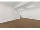 Large basement featuring neutral carpeting and a utility closet at 305 Bridgewater Ter, Canton, GA 30115