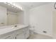 Bright bathroom with white vanity, tile flooring, and shower/tub combination at 305 Bridgewater Ter, Canton, GA 30115