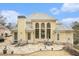 Rear exterior showcases a flagstone patio perfect for outdoor entertaining, adjacent to a well-maintained yard at 4040 Annecy Dr, Atlanta, GA 30331