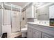 Bathroom featuring a glass enclosed shower, vanity and toilet at 4040 Annecy Dr, Atlanta, GA 30331