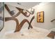 Hallway featuring unique wall art and tile flooring at 4040 Annecy Dr, Atlanta, GA 30331