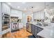 A well-equipped kitchen with granite countertops, stainless appliances, and custom cabinetry at 4040 Annecy Dr, Atlanta, GA 30331