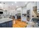 A spacious kitchen features stainless steel appliances, granite countertops, and modern cabinetry at 4040 Annecy Dr, Atlanta, GA 30331