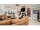 A comfortable living room is furnished with a fireplace, couches, and a pool table at 4040 Annecy Dr, Atlanta, GA 30331