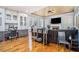 Cozy living room with a fireplace, built-in cabinets, and large windows at 4040 Annecy Dr, Atlanta, GA 30331
