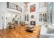 Spacious living room with a fireplace, built-in shelving, and hardwood floors at 4040 Annecy Dr, Atlanta, GA 30331