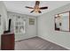 Cozy bedroom featuring neutral paint, carpeted floor, and natural light streaming in through the window at 618 Jenmarie Sw Dr, Mableton, GA 30126