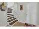 Welcoming entryway with staircase and tile flooring, offering a glimpse of the home's interior at 618 Jenmarie Sw Dr, Mableton, GA 30126
