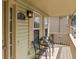 Relaxing front porch featuring comfortable seating, perfect for enjoying the outdoors at 618 Jenmarie Sw Dr, Mableton, GA 30126