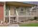Inviting front porch with a seating area and charming details, enhancing the curb appeal at 618 Jenmarie Sw Dr, Mableton, GA 30126