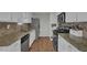 Well-equipped kitchen with granite countertops, stainless steel appliances, and ample cabinet space at 618 Jenmarie Sw Dr, Mableton, GA 30126