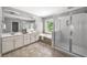 Bright bathroom with double sinks, garden tub, and separate shower at 2742 Oak Village Trl, Decatur, GA 30032