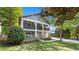 Charming two-story home with inviting front porch and manicured lawn at 2742 Oak Village Trl, Decatur, GA 30032
