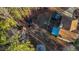 Aerial view of backyard, trampoline, shed, and proximity to lush trees at 4558 Bronte Ln, Douglasville, GA 30135