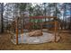 Backyard fire pit area with seating perfect for entertaining and enjoying outdoor gatherings at 4558 Bronte Ln, Douglasville, GA 30135