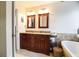 Bathroom boasts double vanity, granite countertops, and a soaking tub at 4558 Bronte Ln, Douglasville, GA 30135
