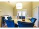 Formal dining room featuring modern lighting, and an elegant table with seating for six at 4558 Bronte Ln, Douglasville, GA 30135