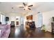 Large living room with wood floors and a wet bar at 4558 Bronte Ln, Douglasville, GA 30135